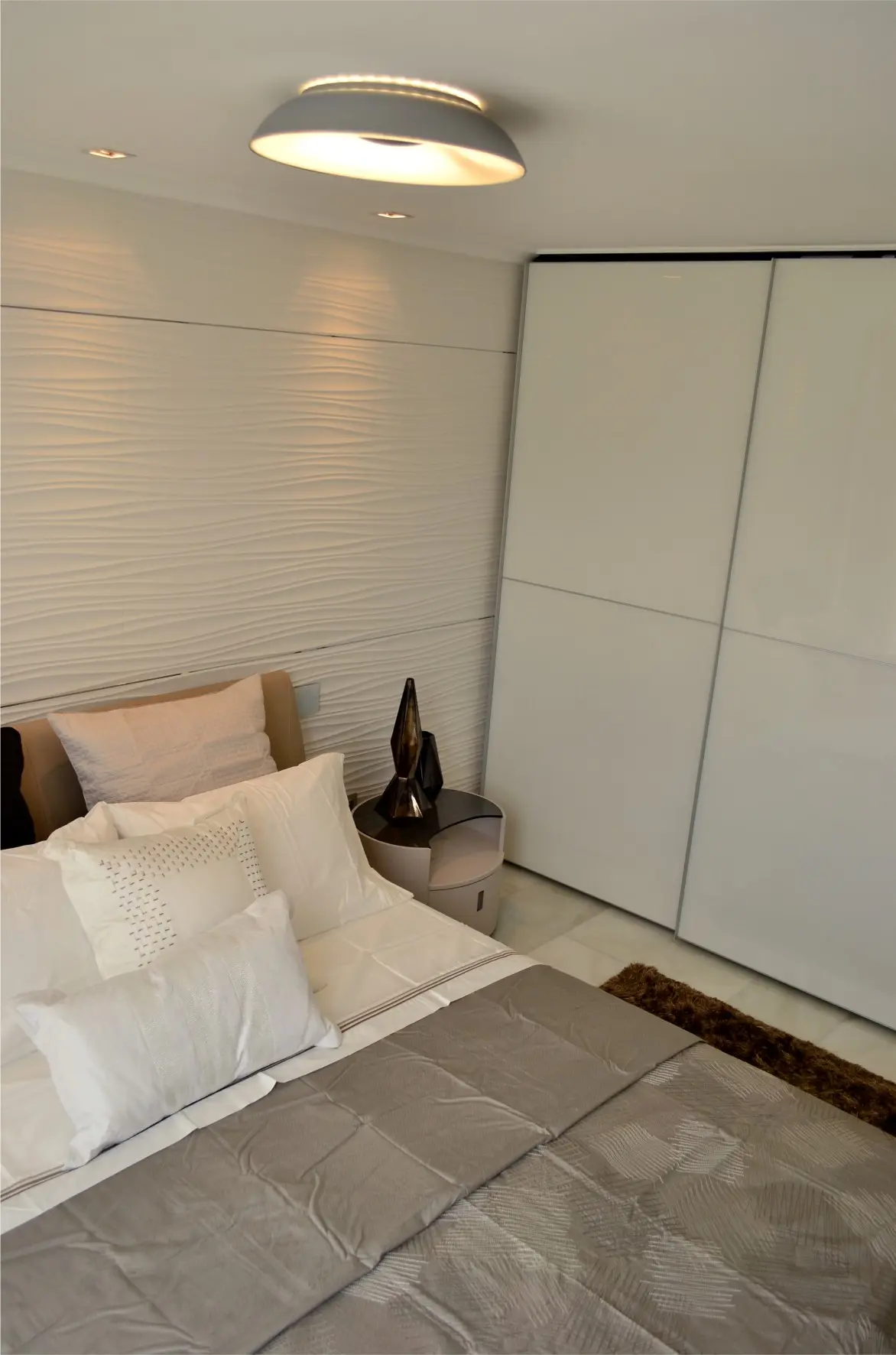 Bed with lamp and closet