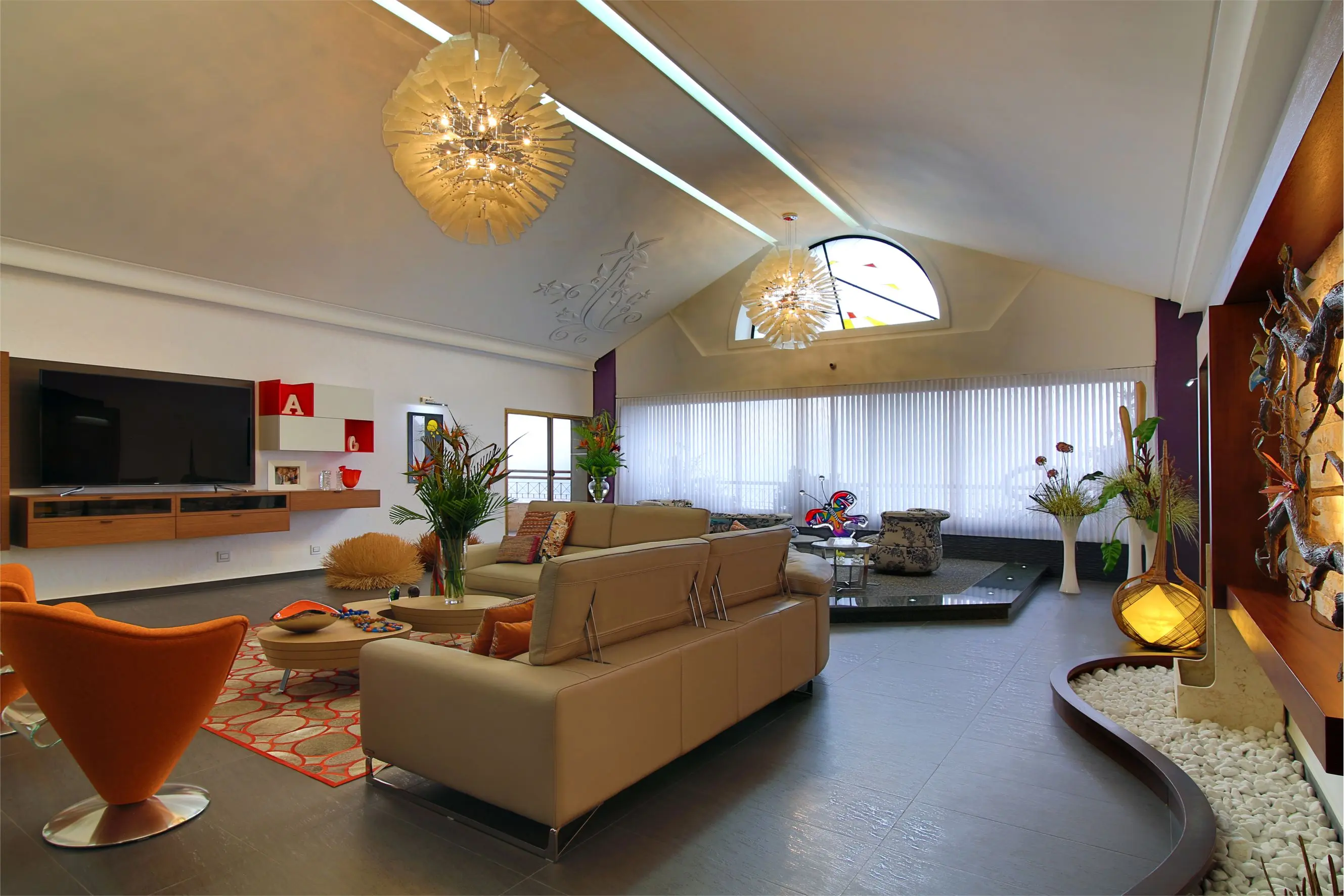 Panoramic view of living room with ceiling lamps and television