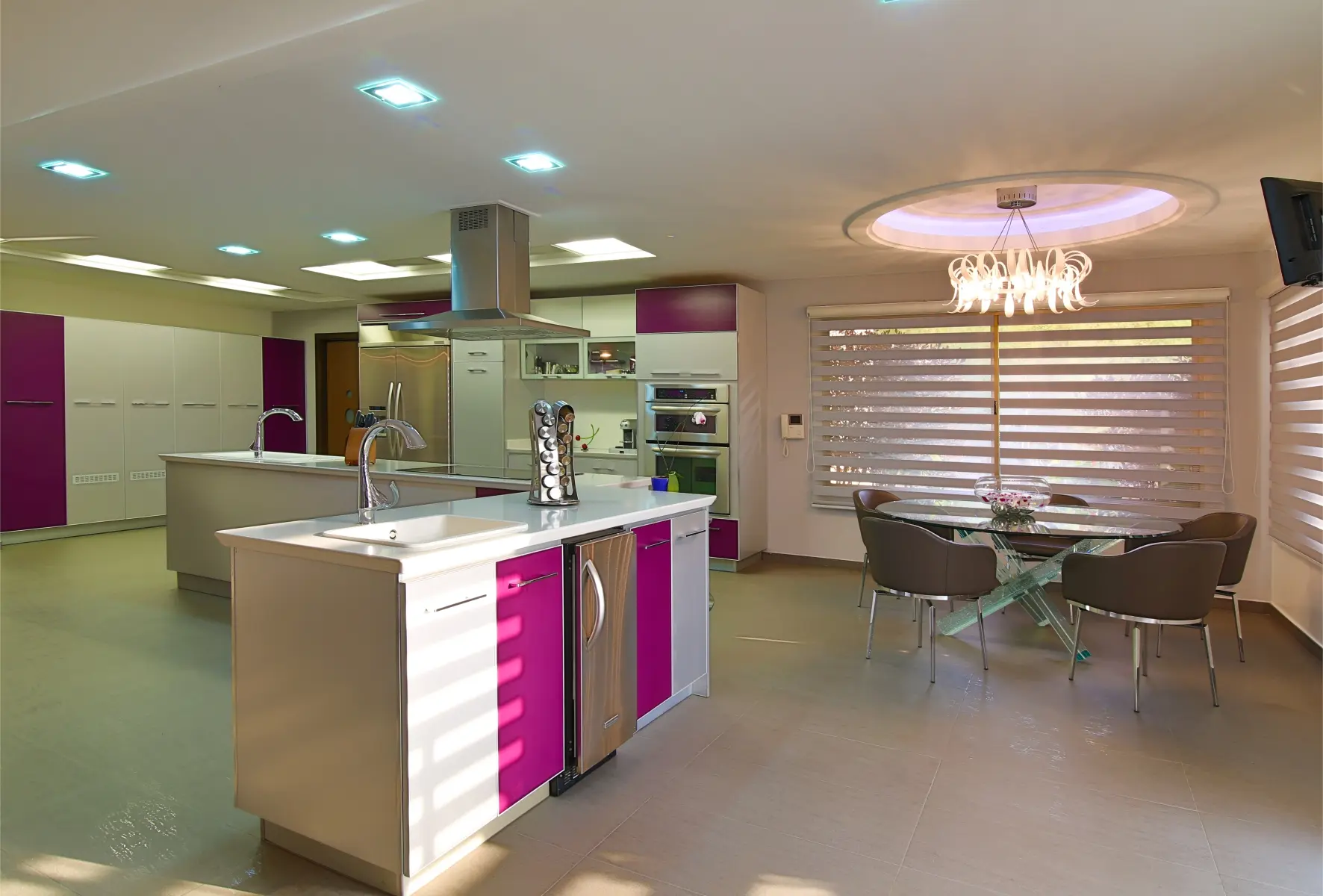 Broad white kitchen with purple details