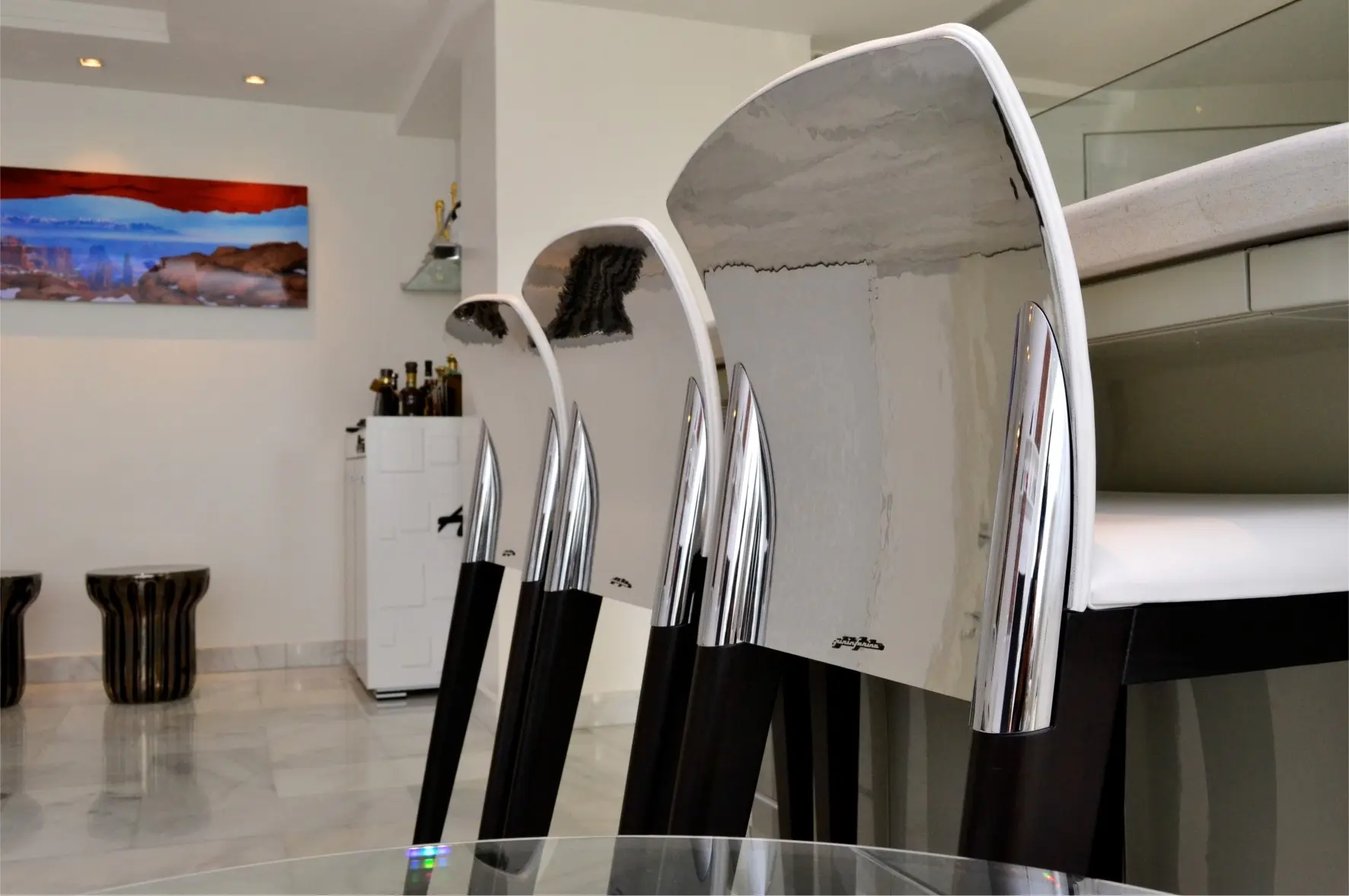 Reflective silver chairs