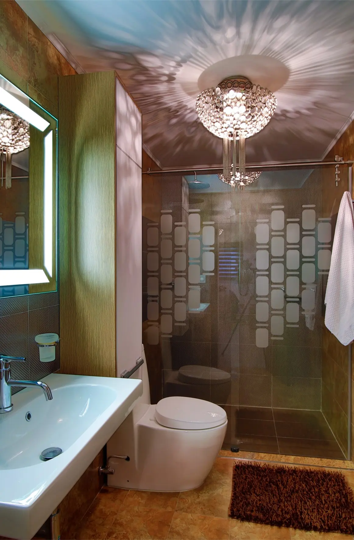 Ocher bathroom with crystal lamp and shower