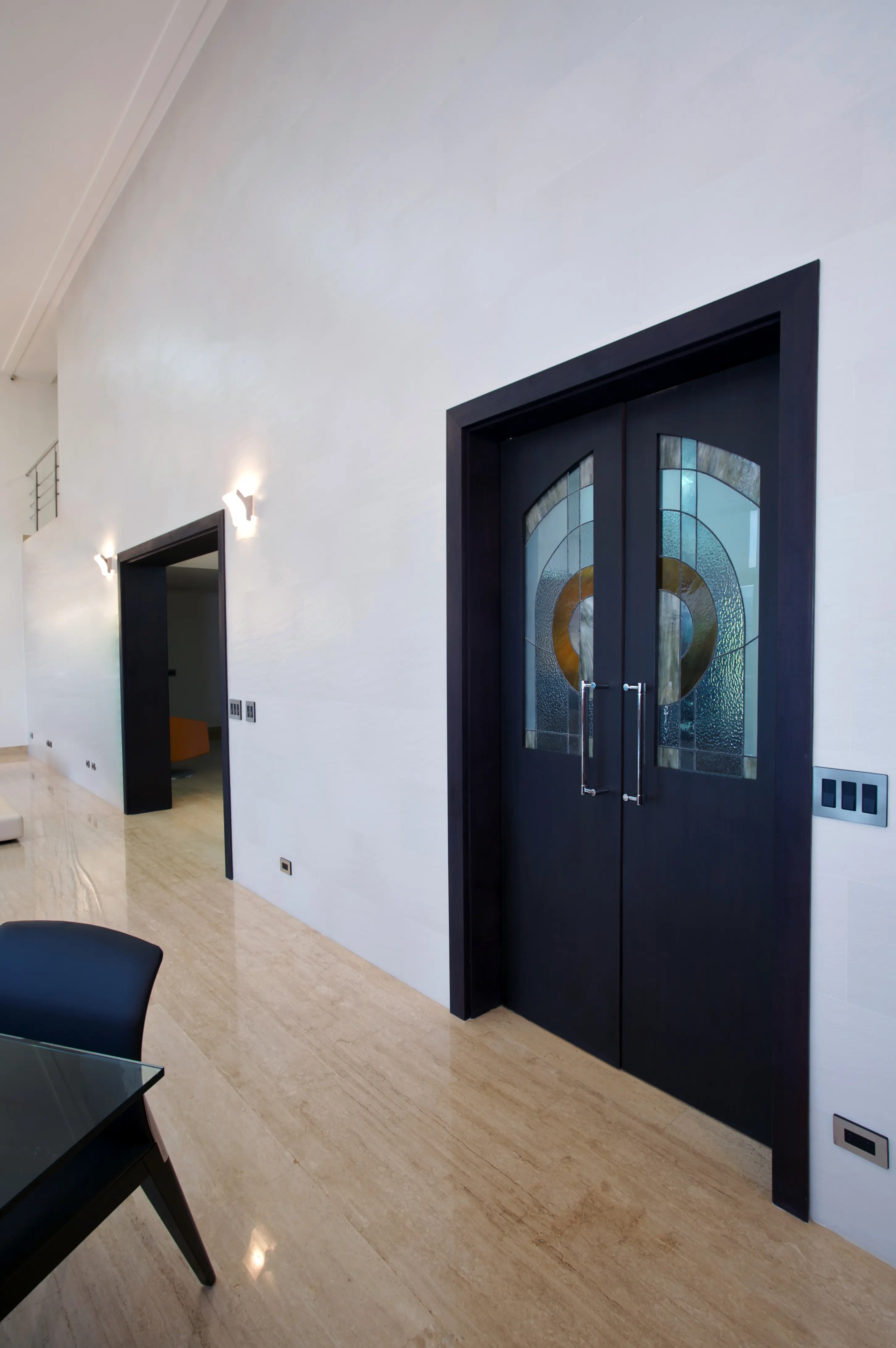 Black door in white wall