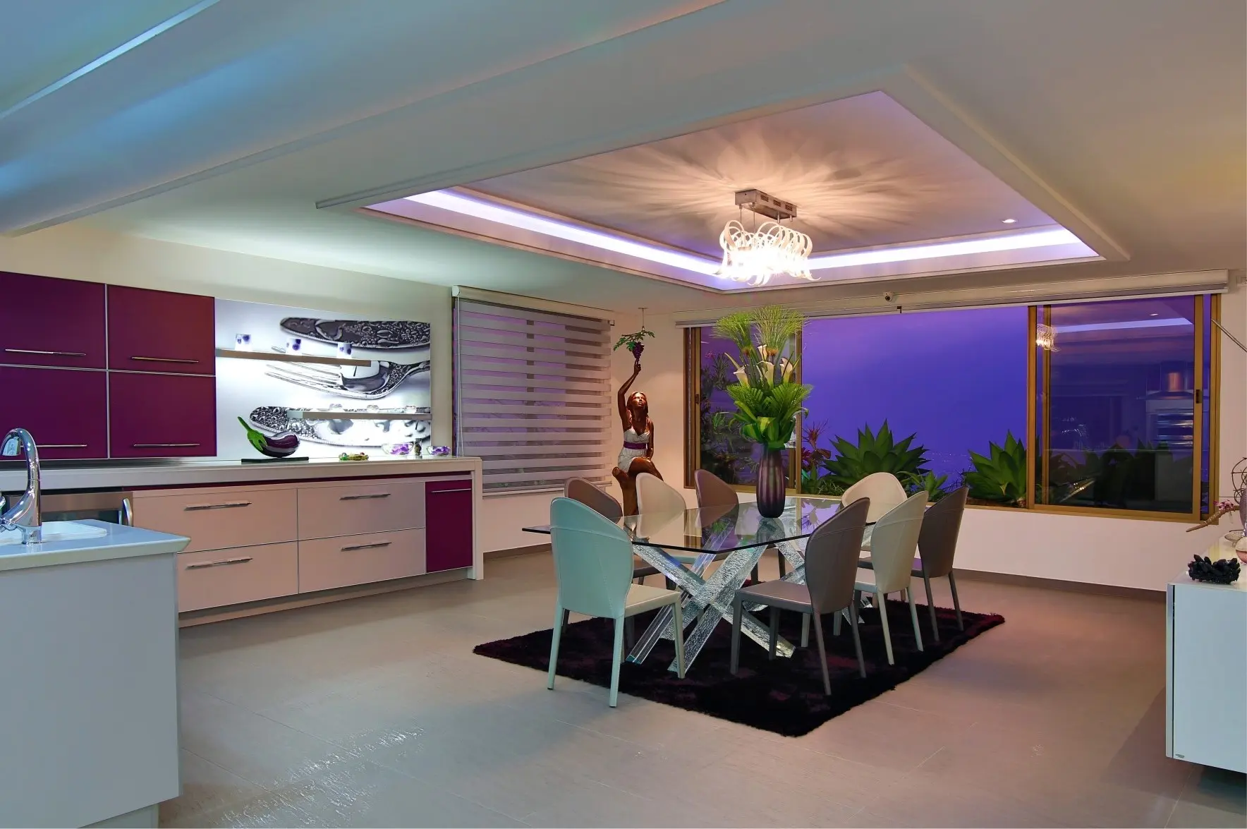 Dining table with black carpet and flowerpot