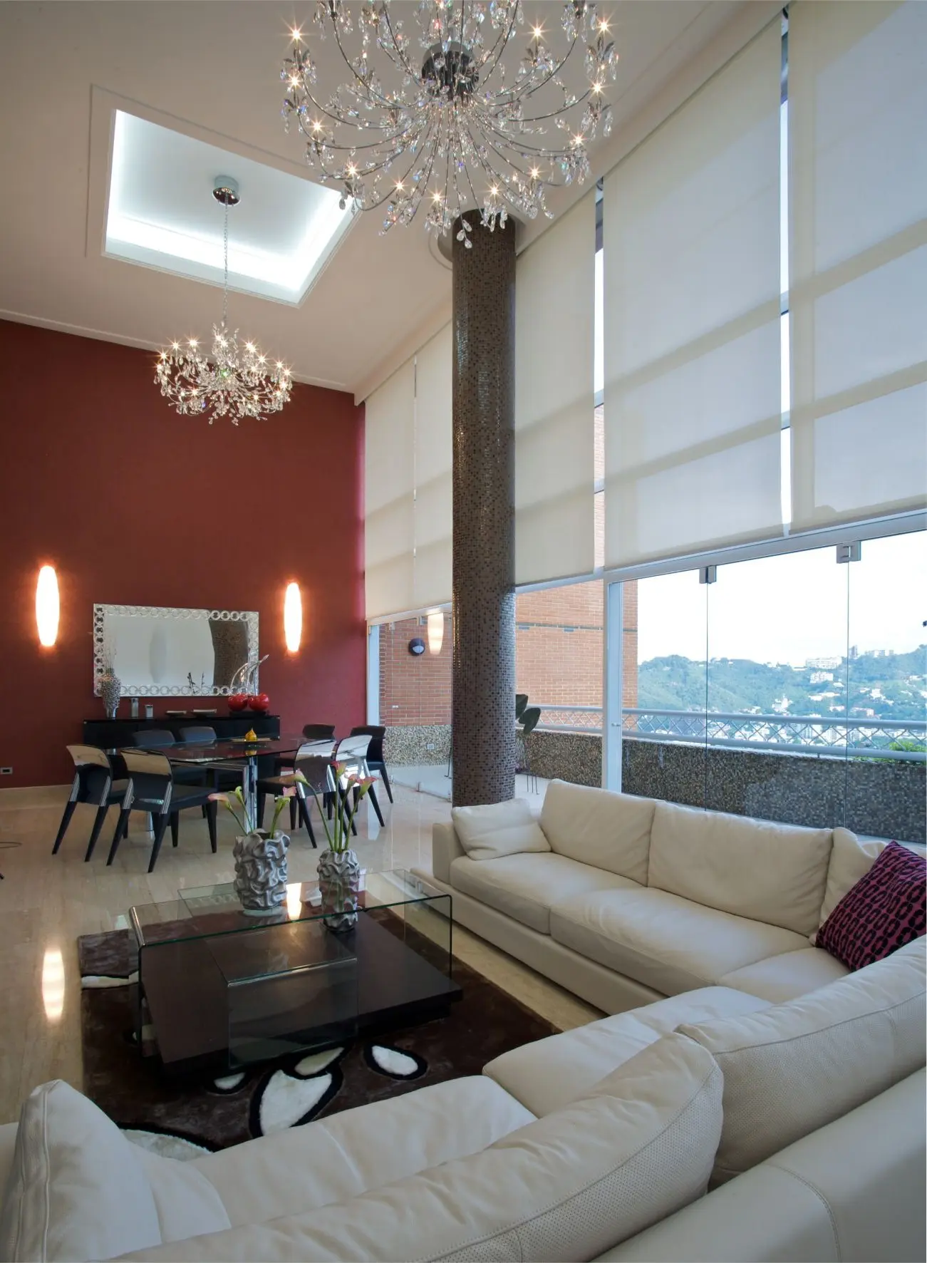 Sofa with dining table in background